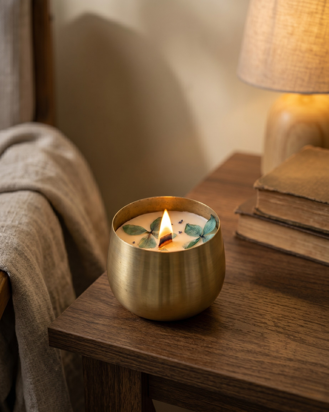 Fragnam Golden Glow Urli Candle with intricate design and warm glow, ideal for home decor and creating a cozy ambiance.