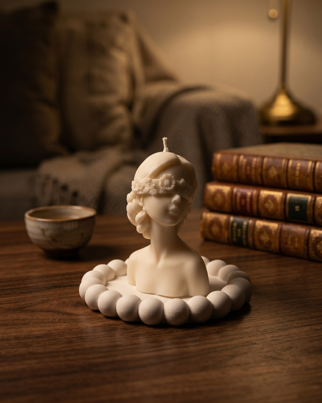 Fragnam Madhubala Muse Candle with intricate design and warm glow, perfect for decorative and aromatic ambiance.