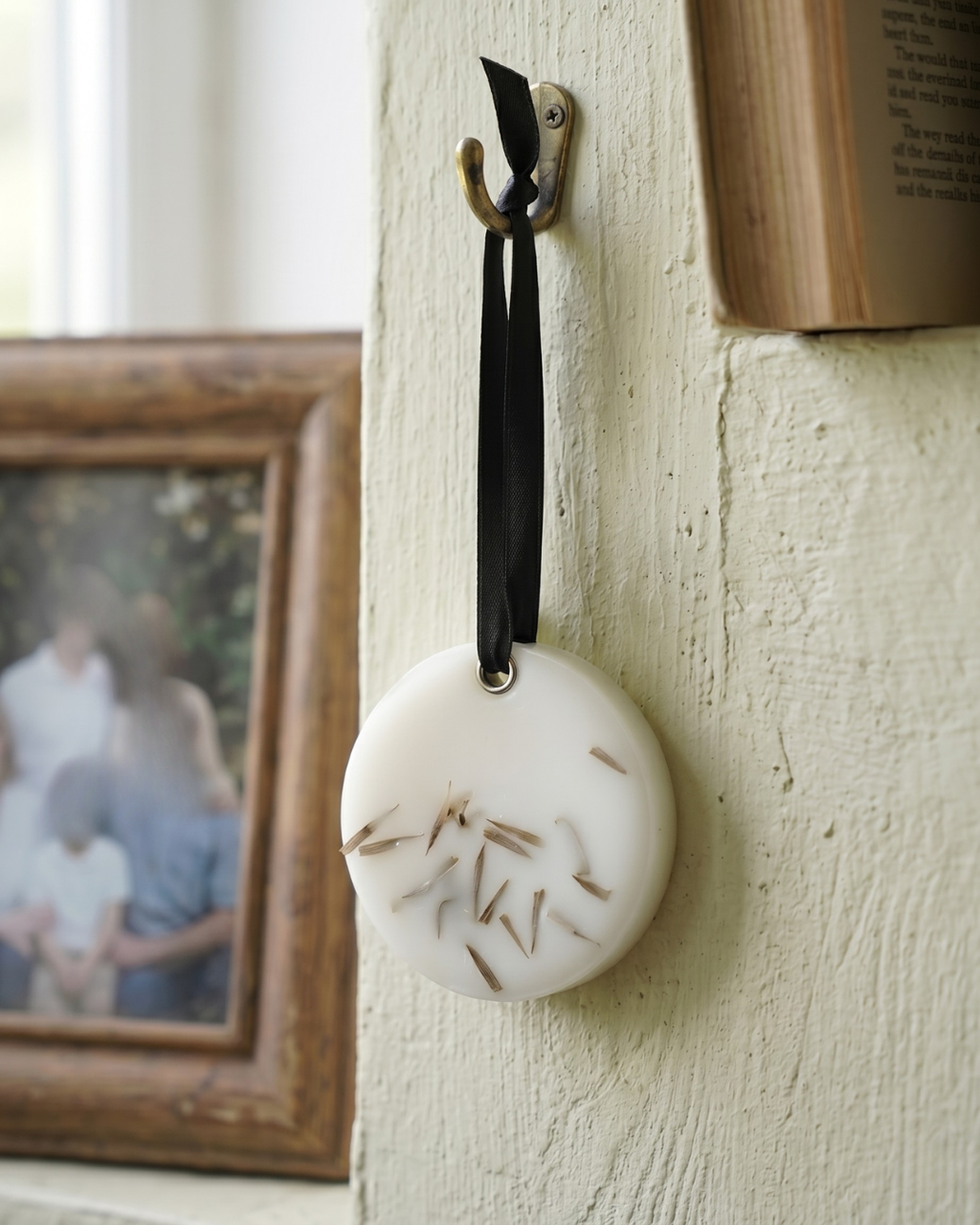 Fragnam soft round hanging ornament with smooth surface and pastel color, designed for decorative use in home or office.