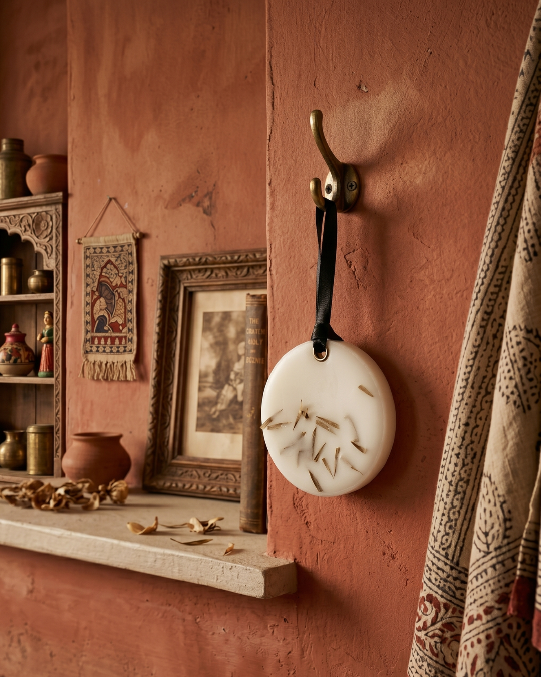 Fragnam soft round hanging ornament with a smooth, plush texture and pastel color, ideal for home decor or festive decoration.