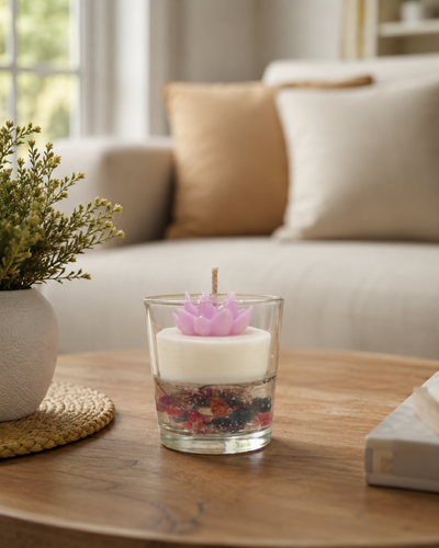 Fragnam Blushie Lotus Candle with pink and white lotus flower design, wax candle in a clear glass holder.