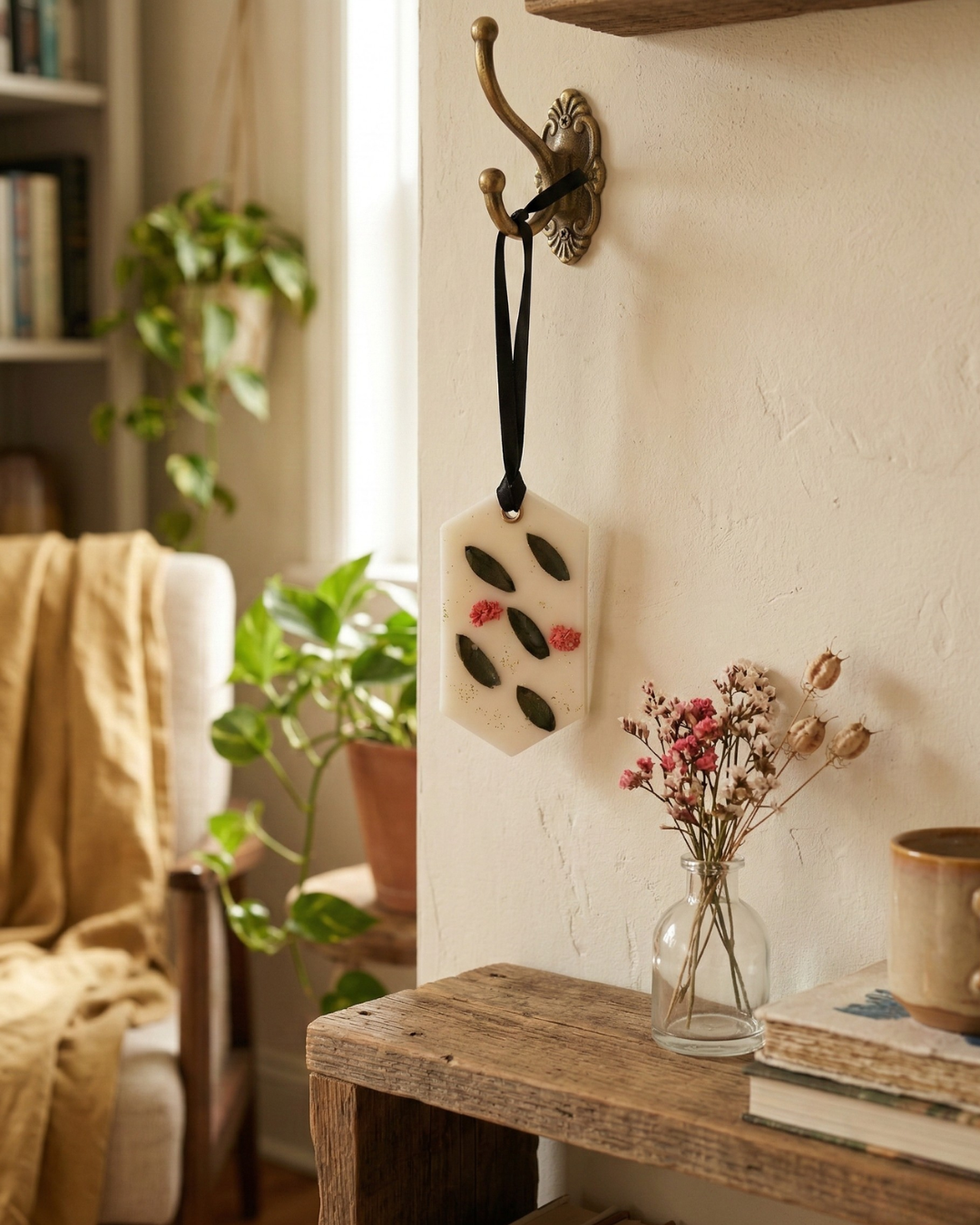 Fragnam floral botanical wax hanging decoration with colorful flower patterns and intricate design on a white background.