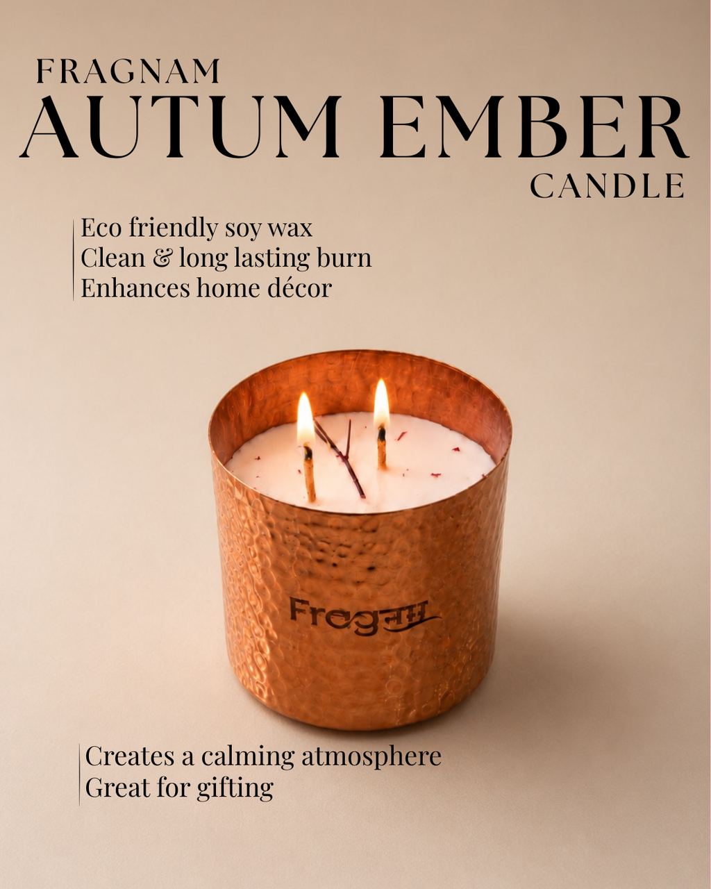 Fragnam Autumn Ember Candle with warm-toned glass holder and flickering flame on a rustic wooden surface.
