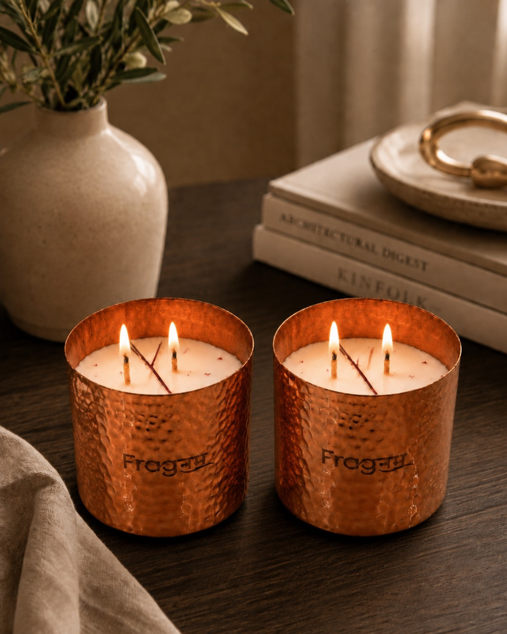 Fragnam Autumn Ember Candle with warm amber-colored wax and a burning wick, perfect for cozy home ambiance.