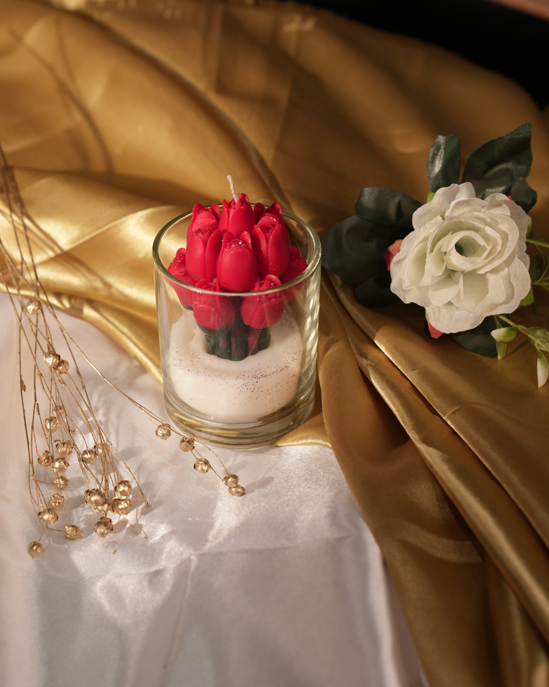 Fragnam Crimson Tulip Bloom Candle with vibrant red tulip design and elegant glass holder on a white background