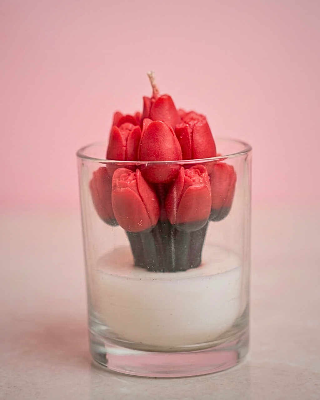 Fragnam Crimson Tulip Bloom Candle with vibrant red tulip design and elegant glass holder, perfect for decorative lighting.