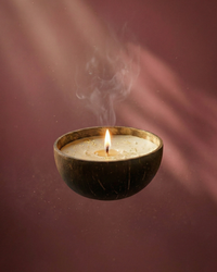 Fragnam Coco Calm Candle with a white ceramic holder and a soothing scent, perfect for relaxing ambiance.