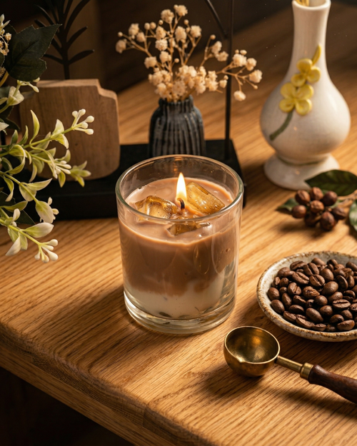 Fragnam Coffee Latte Glow Candle with warm lit flame, soy wax, and cozy coffee scent in a glass jar.