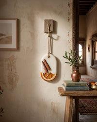 Fragnam Lemon Bark Hanging air freshener with lemon scent, featuring a decorative bark design hanging from a string.